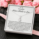 The perfect gift for your future mother in law.Ribbon shaped,14K white gold over stainless steel,clear crystals,a sparkling 7mm round Cubic Zirconia. Heartfelt message card included guaranteed to melt your new mother in laws heart.