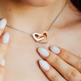 Your Mom will love this Interlocking Hearts Necklace with heartfelt message card. Cubic Zirconia. High quality polished surgical steel.18"-22".