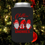 Chillin With My Gnomies Christmas Can Wrap. Keeps Your Beverages ICE COLD! All Standard Sized Cans. .JUST RELEASED, Limited Time Only, Not available in stores. Makes for the perfect Christmas Gift or Stocking Stuffer! Cuddle with your lover, your family or friends and enjoy a cold beverage while cuddling around the TV set, Laptop or fireplace! Has three Gnomes on it with the text: Chillin' with my Gnomies.