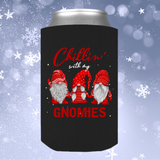 Chillin With My Gnomies Christmas Can Wrap. Keeps Your Beverages ICE COLD! All Standard Sized Cans. .JUST RELEASED, Limited Time Only, Not available in stores. Makes for the perfect Christmas Gift or Stocking Stuffer! Cuddle with your lover, your family or friends and enjoy a cold beverage while cuddling around the TV set, Laptop or fireplace! Has three Gnomes on it with the text: Chillin' with my Gnomies.