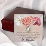 Bridesmaid proposal Necklace Gift with heartfelt message. " Because you've helped me grow, kept me grounded, lifted my spirit and brightened my life, I'd be honored to have you as my Bridesmaid". Brilliant 14k white gold over stainless steel. Zirconia crystal with smaller cubic zirconia