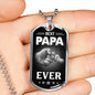 A HAND HOLDING A BEST PAPA EVER LUXURY DOG TAG FOR FATHER'S DAY COL SILVER