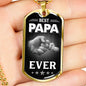 A HAND HOLDING A BEST PAPA EVER LUXURY DOG TAG FOR FATHER'S DAY COL GOLD