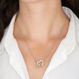 Woman wearing a Beautiful Interlocking Hearts Necklace Gift