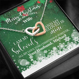 Personalize the message card with your name to create the Perfect Keepsake!The Perfect Christmas Gift for your Wife and Soulmate. Surprise her this Christmas with this Beautiful Interlocking Hearts necklace watch her heart melt when you give it to her!Two hearts embellished with Cubic Zirconia stones, interlocked together as a symbol of never-ending love.Height 0.6" (1.5cm) Width 1.1" (2.7cm) Adjustable cable chain 18"-22"