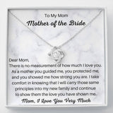 The perfect gift for mom on your wedding day. Brilliant 14k white gold, Zirconia crystal with smaller cubic zirconia. Includes a heartfelt message card from daughter to mother.