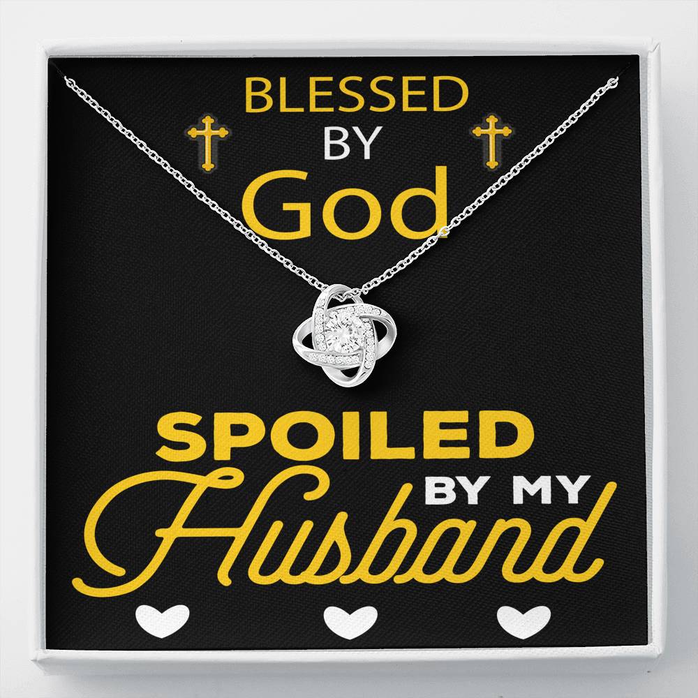 This Love Knot Necklace represents an unbreakable bond between two souls. This symbol of eternal love is a forever favorite and trending everywhere. Comes with a free luxury gift box and a message card that reads Blessed by god, spoiled by your husband. Surprise your loved one with this gorgeous gift today.14k white gold over stainless steel  6mm round cut cubic zirconia stone
