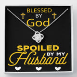This Love Knot Necklace represents an unbreakable bond between two souls. This symbol of eternal love is a forever favorite and trending everywhere. Comes with a free luxury gift box and a message card that reads Blessed by god, spoiled by your husband. Surprise your loved one with this gorgeous gift today.14k white gold over stainless steel  6mm round cut cubic zirconia stone