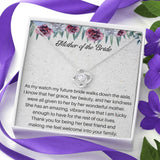 The perfect gift for your new mother in law from the groom. Brilliant 14k white gold, Zirconia crystal with smaller cubic zirconia. Includes a heartfelt message card from the groom to his new mother in law.