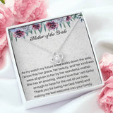 The perfect gift for your new mother in law from the groom. Brilliant 14k white gold, Zirconia crystal with smaller cubic zirconia. Includes a heartfelt message card from the groom to his new mother in law.