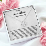 The perfect gift for your future mother in law. Brilliant 14k white gold Love Knot necklace, Zirconia crystal with smaller cubic zirconia. Includes a heartfelt message card included guaranteed to melt your new mother in laws heart.