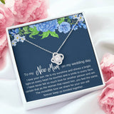 The perfect gift for your future mother in law. Brilliant 14k white gold Love Knot necklace, Zirconia crystal with smaller cubic zirconia. Includes a heartfelt message card included guaranteed to melt your new mother in laws heart.