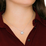 Surprise your loved one with this gorgeous this beautiful Love Knot Necklace gift today representing an unbreakable bond between two souls.Brilliant 14k white gold over stainless steel,adjustable cable chain with alobster clasp.The center cubic zirconia crystalis surrounded with smaller cubic zirconia,showcasing added sparkle and shine to this gorgeous gift.