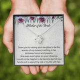 The perfect gift for your new mother in law from the groom. Brilliant 14k white gold, Zirconia crystal with smaller cubic zirconia. Includes a heartfelt message card from the groom to his new mother in law.