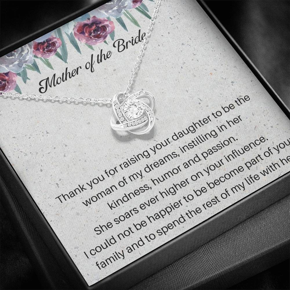 The perfect gift for your new mother in law from the groom. Brilliant 14k white gold, Zirconia crystal with smaller cubic zirconia. Includes a heartfelt message card from the groom to his new mother in law.