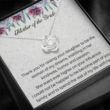 The perfect gift for your new mother in law from the groom. Brilliant 14k white gold, Zirconia crystal with smaller cubic zirconia. Includes a heartfelt message card from the groom to his new mother in law.