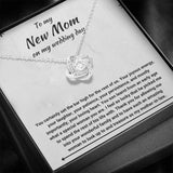 The perfect gift for your future mother in law. Brilliant 14k white gold Love Knot necklace, Zirconia crystal with smaller cubic zirconia. Includes a heartfelt message card included guaranteed to melt your new mother in laws heart.