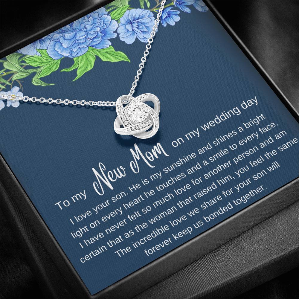 The perfect gift for your future mother in law. Brilliant 14k white gold Love Knot necklace, Zirconia crystal with smaller cubic zirconia. Includes a heartfelt message card included guaranteed to melt your new mother in laws heart.