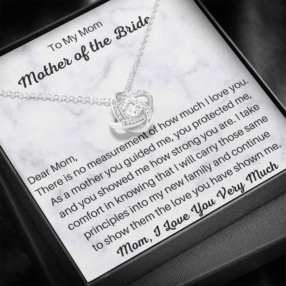 The perfect gift for mom on your wedding day. Brilliant 14k white gold, Zirconia crystal with smaller cubic zirconia. Includes a heartfelt message card from daughter to mother.