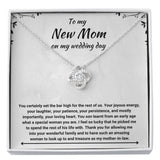 The perfect gift for your future mother in law. Brilliant 14k white gold Love Knot necklace, Zirconia crystal with smaller cubic zirconia. Includes a heartfelt message card included guaranteed to melt your new mother in laws heart.