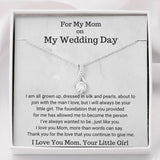 The perfect gift for mom on your wedding day.Ribbon shaped,14K white gold over stainless steel,clear crystals, a sparkling 7mm round Cubic Zirconia. Heartfelt Message Card included.