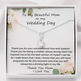 The perfect gift for mom on your wedding day.Ribbon shaped,14K white gold over stainless steel,clear crystals, a sparkling 7mm round Cubic Zirconia. Includes heartfelt message card from daughter to Mother.