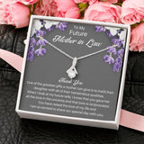 The perfect mother of the bride gift from groom. Heartfelt message card included from Groom to new Mother in law. Ribbon shaped,14K white gold over stainless steel,clear crystals,sparkling 7mm round Cubic Zirconia.