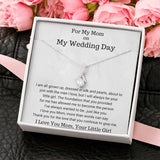 The perfect gift for mom on your wedding day.Ribbon shaped,14K white gold over stainless steel,clear crystals, a sparkling 7mm round Cubic Zirconia. Heartfelt Message Card included.