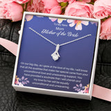 The perfect mother of the bride gift from groom. Heartfelt message card included from Groom to new Mother in law. Ribbon shaped,14K white gold over stainless steel,clear crystals,sparkling 7mm round Cubic Zirconia.
