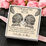 The perfect gift for your wife and mom to be.Ribbon shaped,14K white gold over stainless steel,clear crystals, a sparkling 7mm round Cubic Zirconia.Message card that reads: "To my beautiful wife and radiant mom to be, It makes me smile knowing that our sweet little baby is half me and half the person I love. I love you so much."