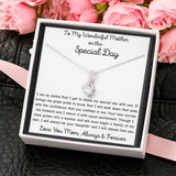 The perfect gift for mom on your wedding day.Ribbon shaped,14K white gold over stainless steel,clear crystals, a sparkling 7mm round Cubic Zirconia. Includes heartfelt message card from daughter to Mother.