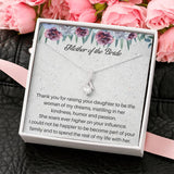 The perfect mother of the bride gift from groom. Heartfelt message card included from Groom to new Mother in law. Ribbon shaped,14K white gold over stainless steel,clear crystals,sparkling 7mm round Cubic Zirconia.