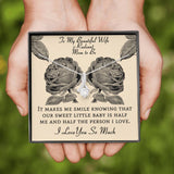 The perfect gift for your wife and mom to be.Ribbon shaped,14K white gold over stainless steel,clear crystals, a sparkling 7mm round Cubic Zirconia.Message card that reads: "To my beautiful wife and radiant mom to be, It makes me smile knowing that our sweet little baby is half me and half the person I love. I love you so much."