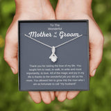 The perfect gift for your future mother in law.Ribbon shaped,14K white gold over stainless steel,clear crystals,  a sparkling 7mm round Cubic Zirconia. Heartfelt message card included guaranteed to melt your new mother in laws heart.