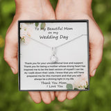 The perfect gift for mom on your wedding day.Ribbon shaped,14K white gold over stainless steel,clear crystals, a sparkling 7mm round Cubic Zirconia. Includes heartfelt message card from daughter to Mother.