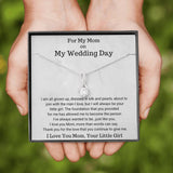 The perfect gift for mom on your wedding day.Ribbon shaped,14K white gold over stainless steel,clear crystals, a sparkling 7mm round Cubic Zirconia. Heartfelt Message Card included.