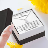 The perfect gift for mom on your wedding day.Ribbon shaped,14K white gold over stainless steel,clear crystals, a sparkling 7mm round  Cubic Zirconia. 