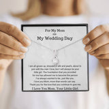 The perfect gift for mom on your wedding day.Ribbon shaped,14K white gold over stainless steel,clear crystals, a sparkling 7mm round Cubic Zirconia. Heartfelt Message Card included.