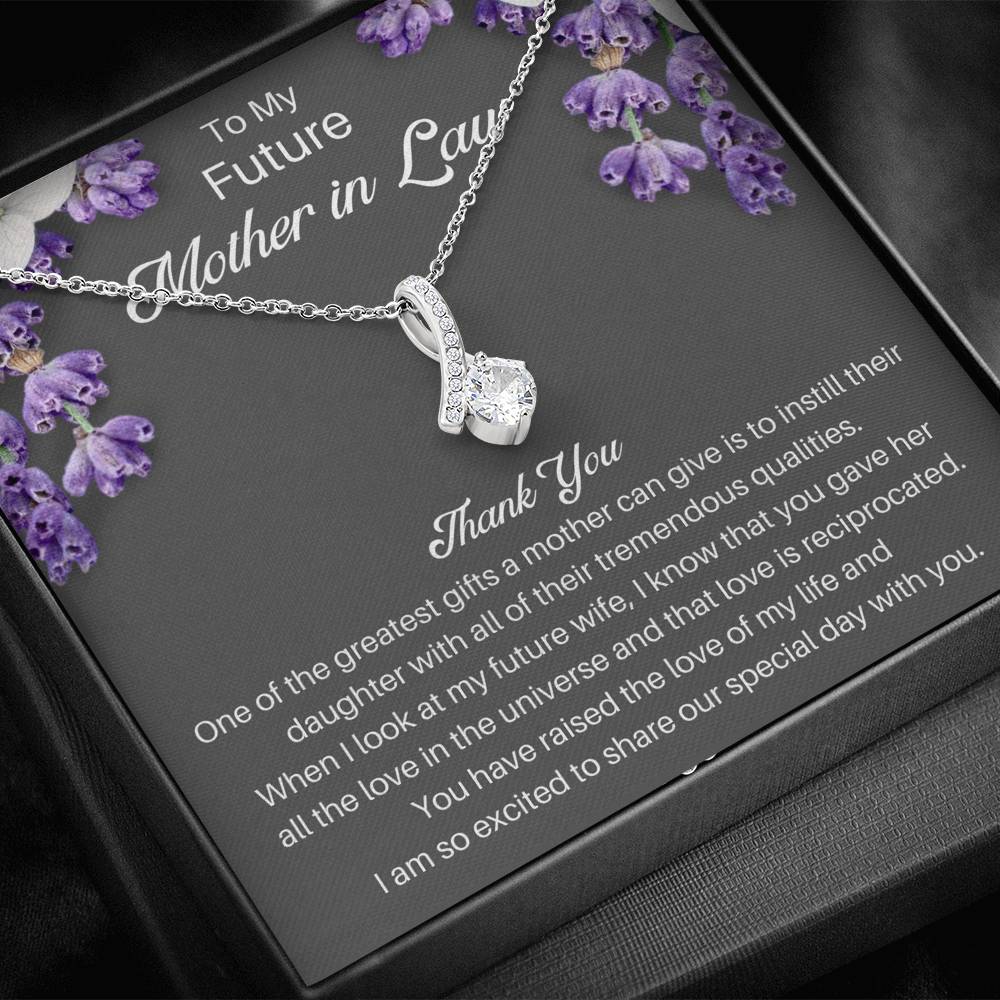 The perfect mother of the bride gift from groom. Heartfelt message card included from Groom to new Mother in law. Ribbon shaped,14K white gold over stainless steel,clear crystals,sparkling 7mm round Cubic Zirconia.