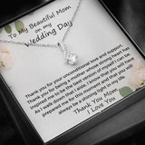 The perfect gift for mom on your wedding day.Ribbon shaped,14K white gold over stainless steel,clear crystals, a sparkling 7mm round Cubic Zirconia. Includes heartfelt message card from daughter to Mother.