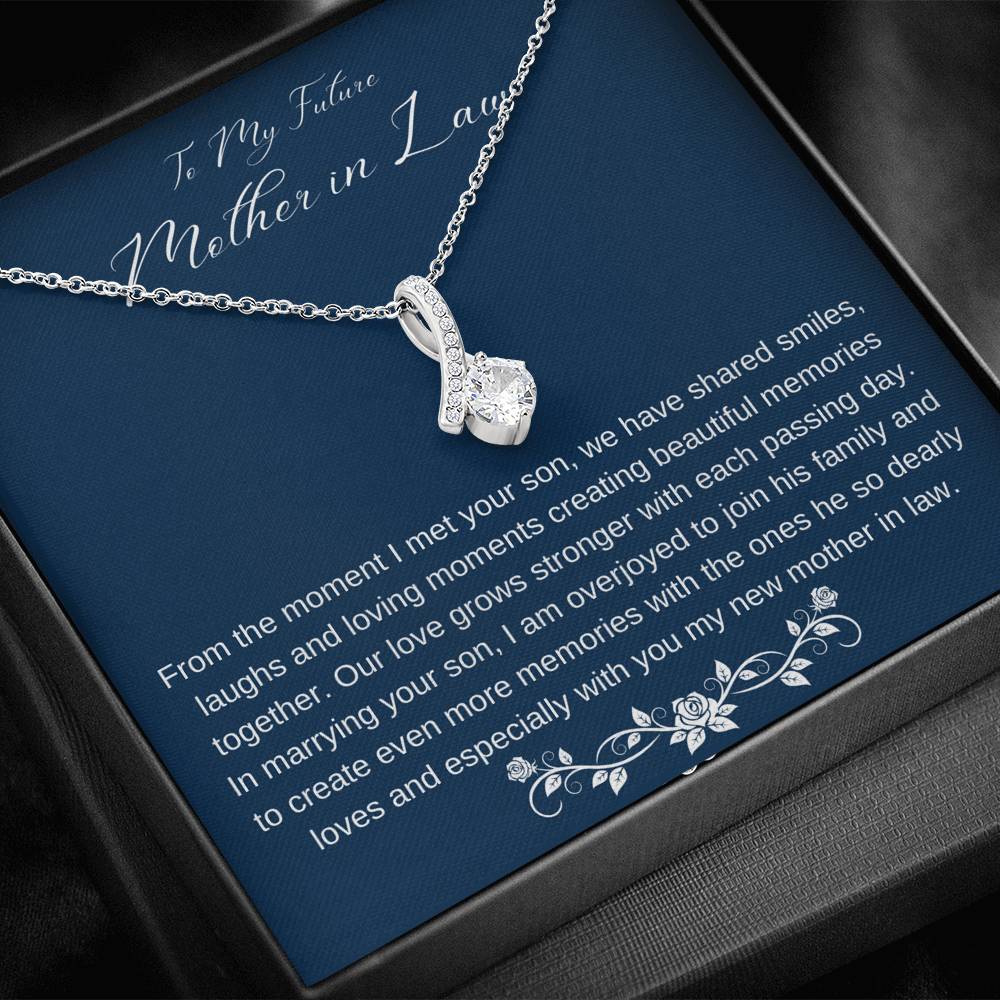 The perfect gift for your future mother in law.Ribbon shaped,14K white gold over stainless steel,clear crystals,  a sparkling 7mm round Cubic Zirconia. Heartfelt message card included guaranteed to melt your new mother in laws heart.
