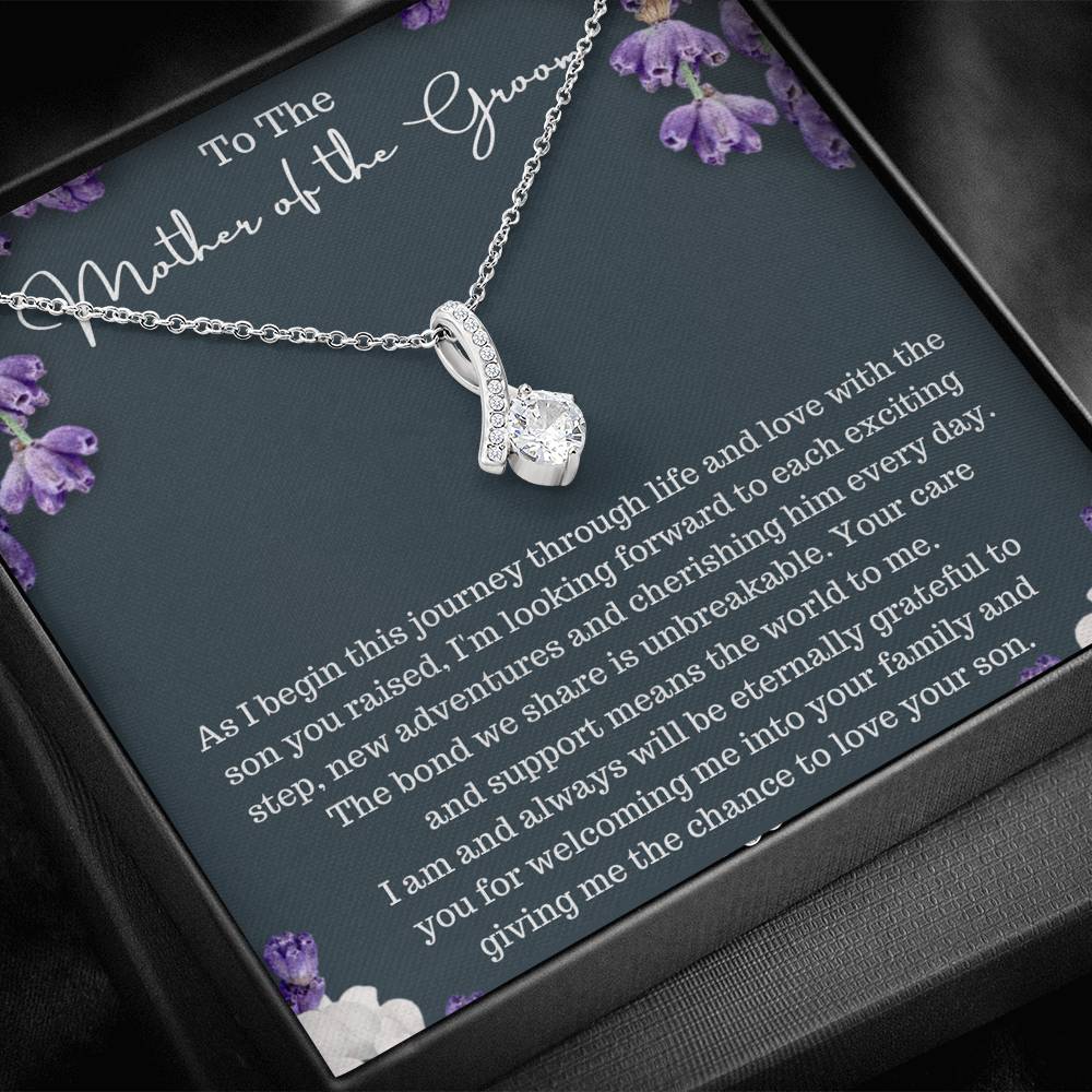 The perfect gift for your future mother in law.Ribbon shaped,14K white gold over stainless steel,clear crystals,  a sparkling 7mm round Cubic Zirconia. Heartfelt message card included guaranteed to melt your new mother in laws heart.