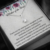 The perfect mother of the bride gift from groom. Heartfelt message card included from Groom to new Mother in law. Ribbon shaped,14K white gold over stainless steel,clear crystals,sparkling 7mm round Cubic Zirconia.