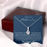 The perfect gift for your future mother in law.Ribbon shaped,14K white gold over stainless steel,clear crystals,  a sparkling 7mm round Cubic Zirconia. Heartfelt message card included guaranteed to melt your new mother in laws heart.
