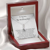 The perfect gift for mom on your wedding day.Ribbon shaped,14K white gold over stainless steel,clear crystals, a sparkling 7mm round Cubic Zirconia. Heartfelt Message Card included.
