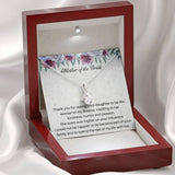 The perfect mother of the bride gift from groom. Heartfelt message card included from Groom to new Mother in law. Ribbon shaped,14K white gold over stainless steel,clear crystals,sparkling 7mm round Cubic Zirconia.