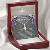 The perfect mother of the bride gift from groom. Heartfelt message card included from Groom to new Mother in law. Ribbon shaped,14K white gold over stainless steel,clear crystals,sparkling 7mm round Cubic Zirconia.