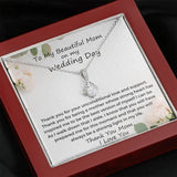 The perfect gift for mom on your wedding day.Ribbon shaped,14K white gold over stainless steel,clear crystals, a sparkling 7mm round Cubic Zirconia. Includes heartfelt message card from daughter to Mother.