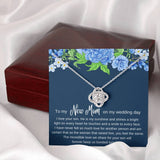 The perfect gift for your future mother in law. Brilliant 14k white gold Love Knot necklace, Zirconia crystal with smaller cubic zirconia. Includes a heartfelt message card included guaranteed to melt your new mother in laws heart.
