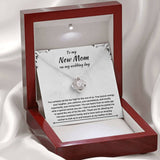 The perfect gift for your future mother in law. Brilliant 14k white gold Love Knot necklace, Zirconia crystal with smaller cubic zirconia. Includes a heartfelt message card included guaranteed to melt your new mother in laws heart.